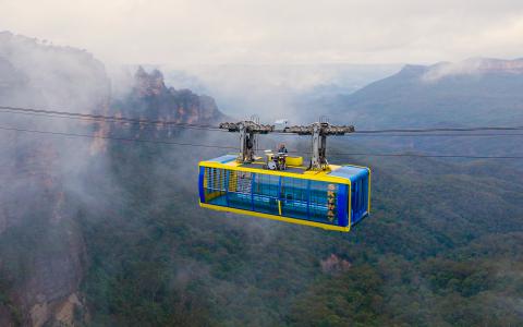 G Flip performs floating 270m above Sydney's Blue Mountains